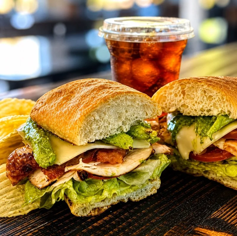 Grilled chicken sandwich and chips with soda at Sam's in Chestertown