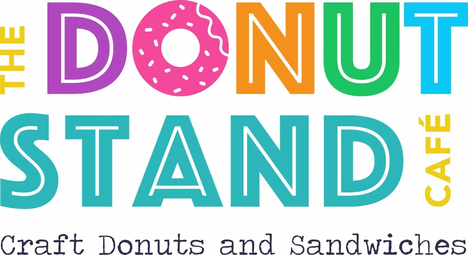 Colorful sign for 'The Donut and Sandwich Cafe' with the text 'Craft donuts and sandwiches' below.