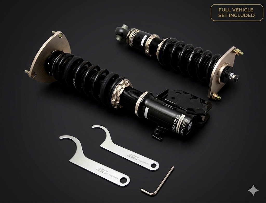Two car suspension shock absorbers with springs, two wrenches, and an Allen wrench all on a black background. A label in the top right corner indicates "Full Vehicle Set Included."