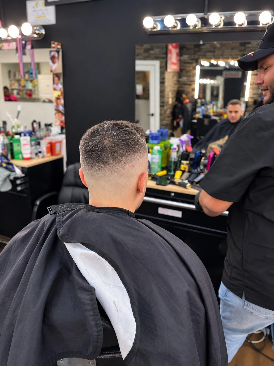 Rear view of a precision skin fade haircut at Prime Time Barber Lounge.