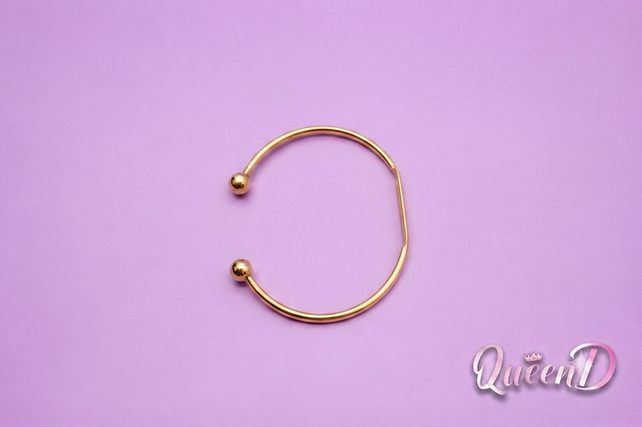 Queen D – Golden Orbit Bracelet