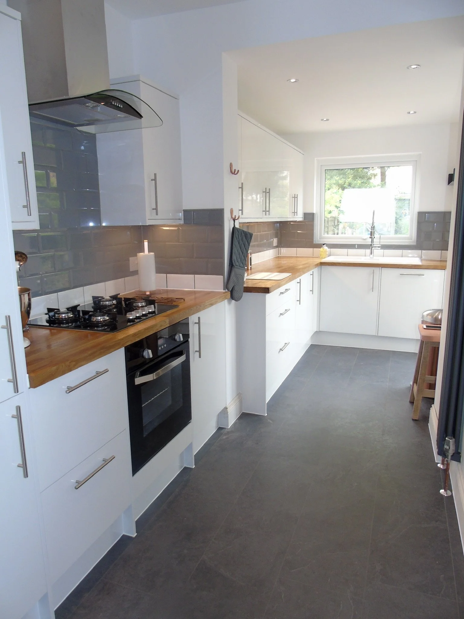 White gloss with solid oak worktops