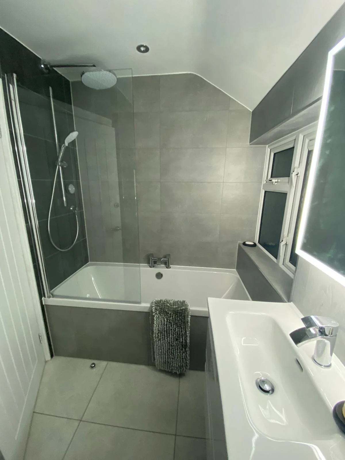 Bath with overhead shower