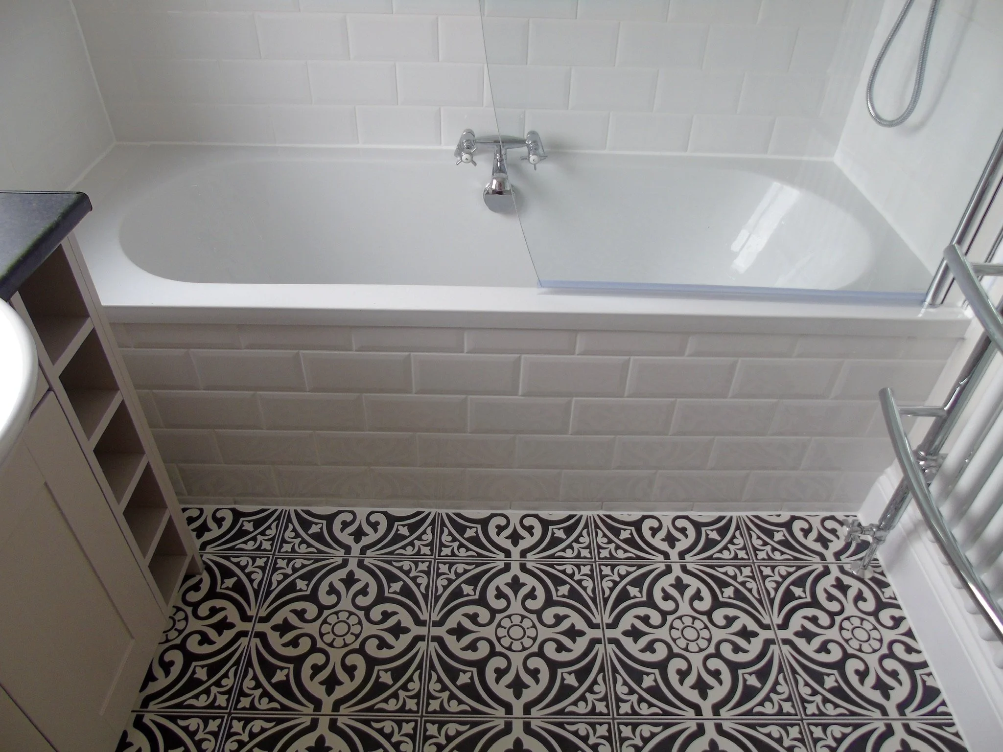 Double ended bath with overhead shower