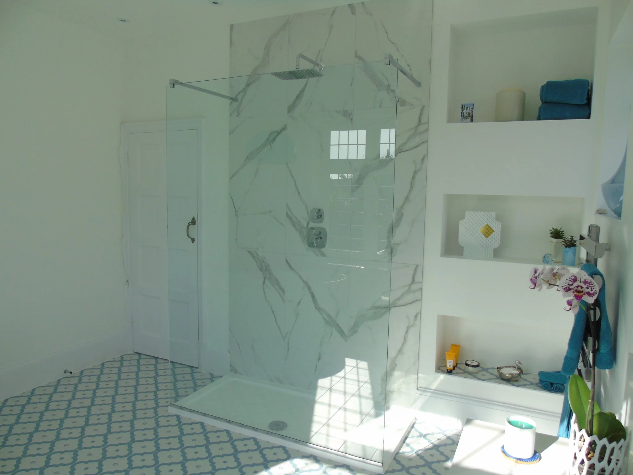 Low profile shower Tray with bespoke Glass screen, freestanding Bath and taps