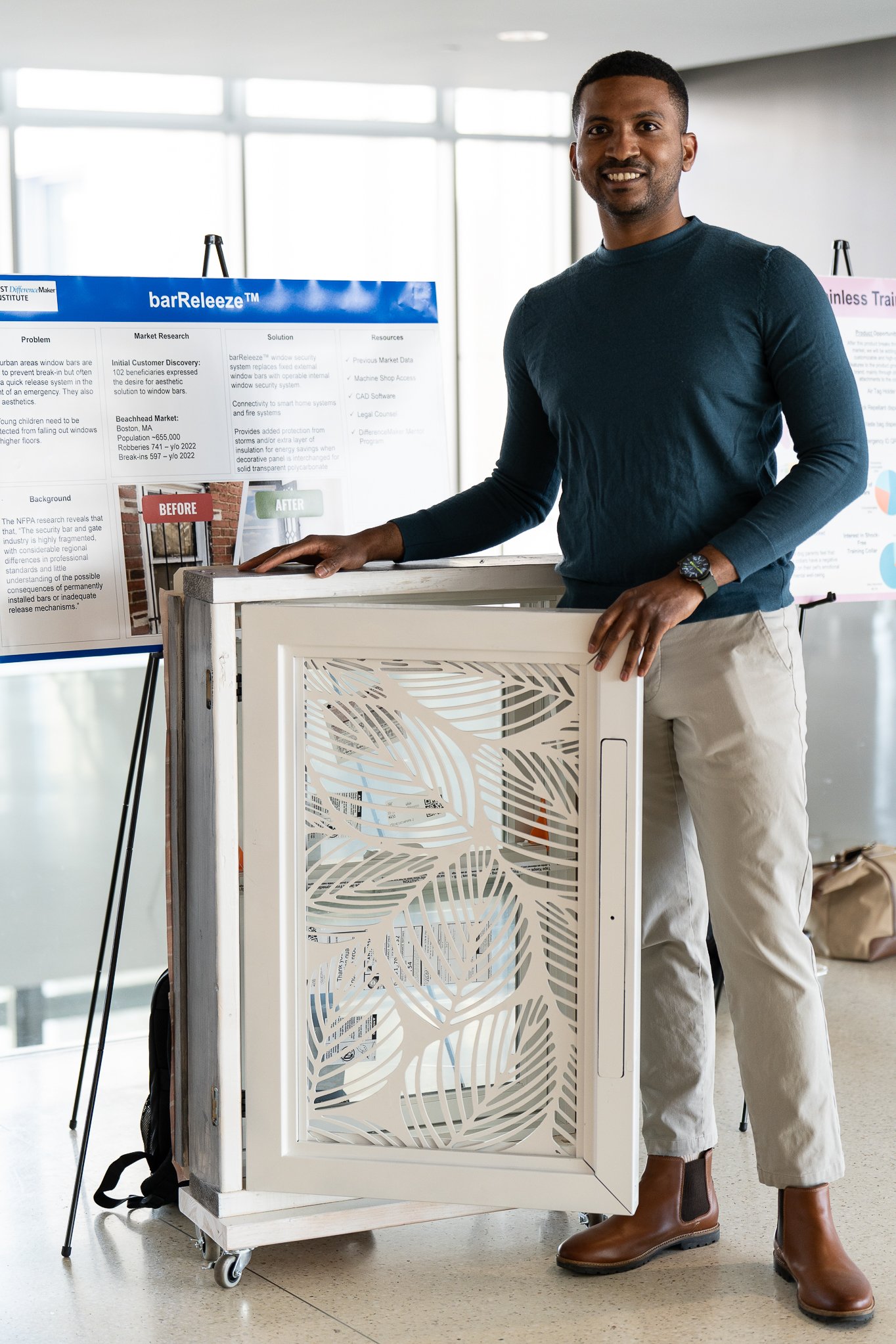 Deigo King, founder of barReleeze™, standing with the first functional barReleeze™ prototype at the 2026 DifferenceMaker Idea Challenge