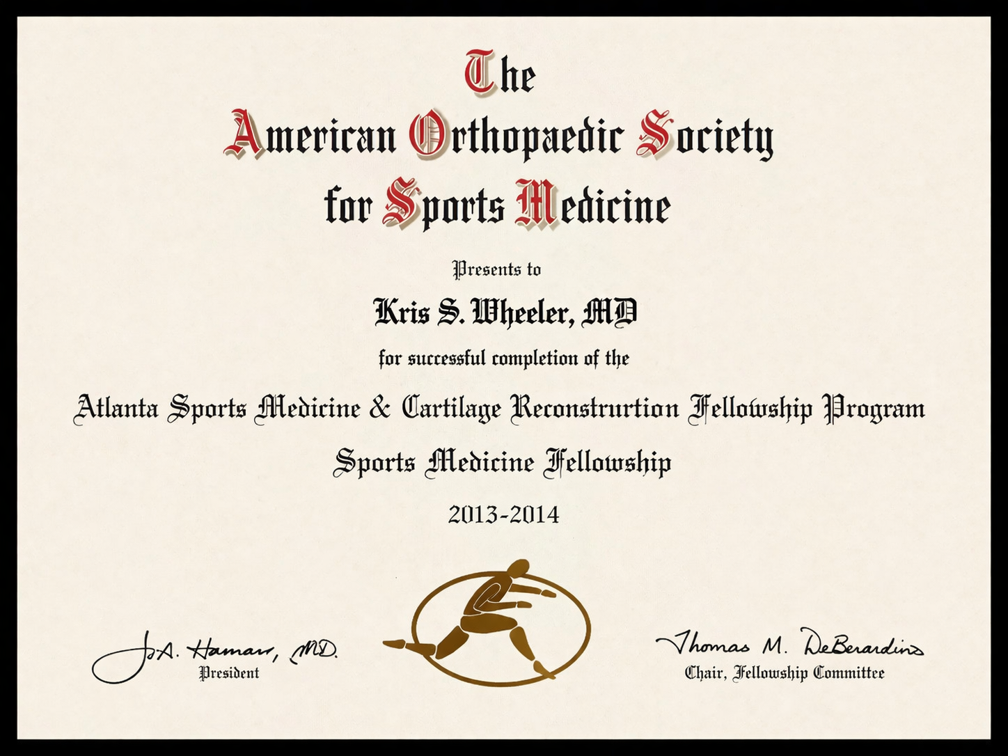 A certificate awarded to Kris S. Wheeler, MD, by the American Orthopaedic Society for Sports Medicine for successful completion of the Atlanta Sports Medicine & Cartilage Reconstruction Fellowship Program for 2013-2014, with signatures from the president and the fellowship committee chair.
