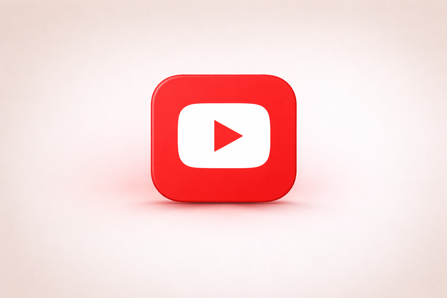 3D rendering of the YouTube logo, a red square with rounded edges and a white play button in the center, on a light pink background.