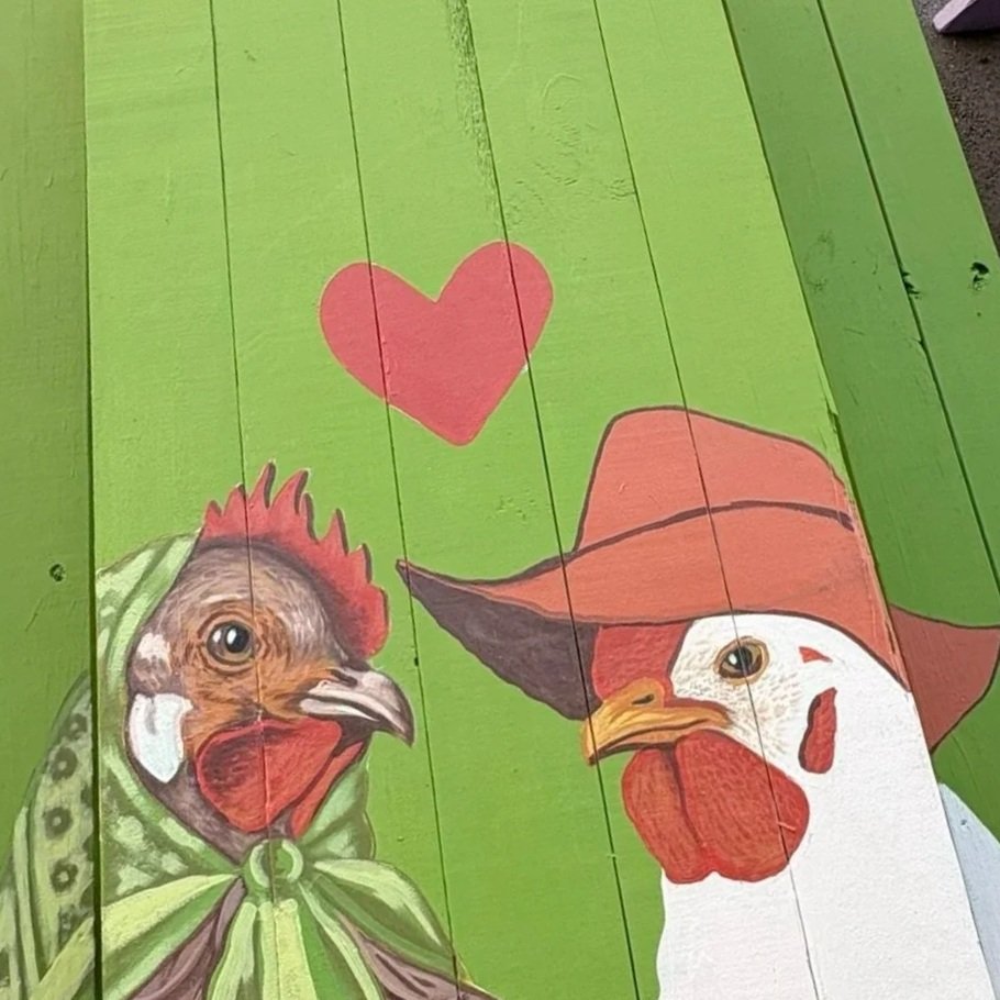 Having someone who stays by your side through every peck, cluck, and crazy day is life's greatest blessing. "Gallinita y Don Gallo" is a playful little tribute to unconditional ol' school love.