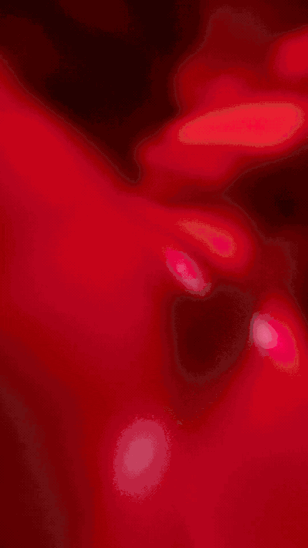 Abstract red and black blurred background with glowing light spots.