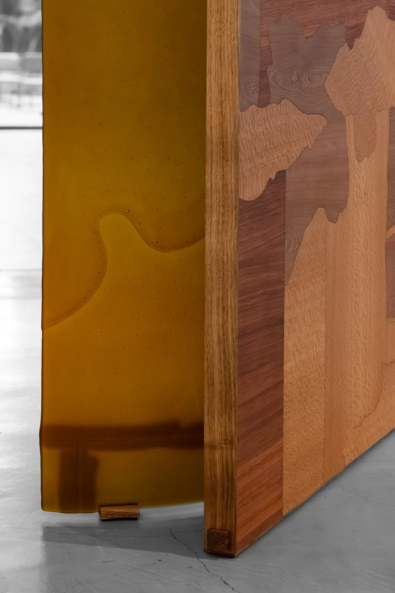 False antithesis I (detail), 2026, kiln formed glass, timber marquetry, dimensions variable. Photo: Jacquie Manning