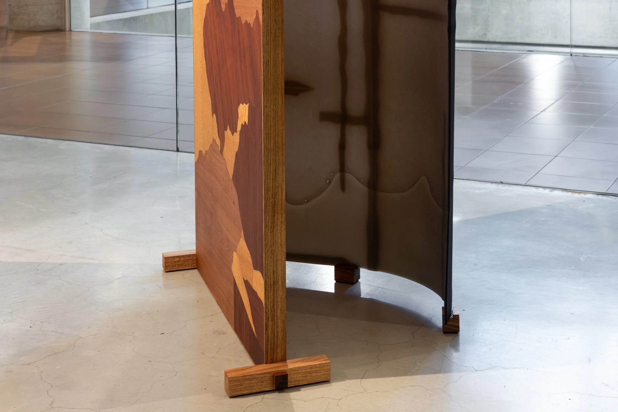 False antithesis III (detail), 2026, kiln formed glass, timber marquetry, felted feral goat fibre, dimensions variable. Photo: Jacquie Manning
