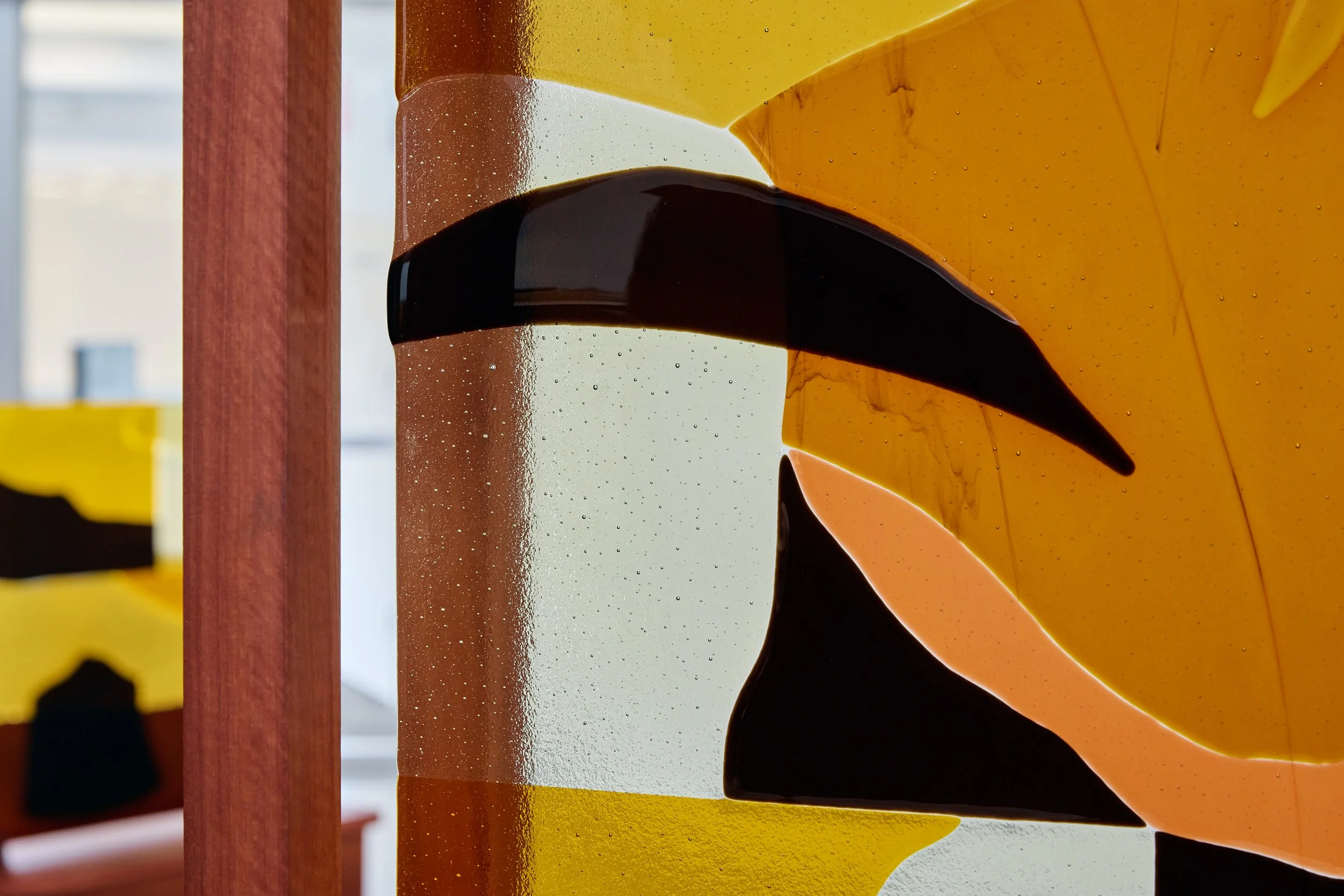 Minor truths III (detail), 2022, kiln formed glass, jarrah. Photo:  Jeremy Weihrauch