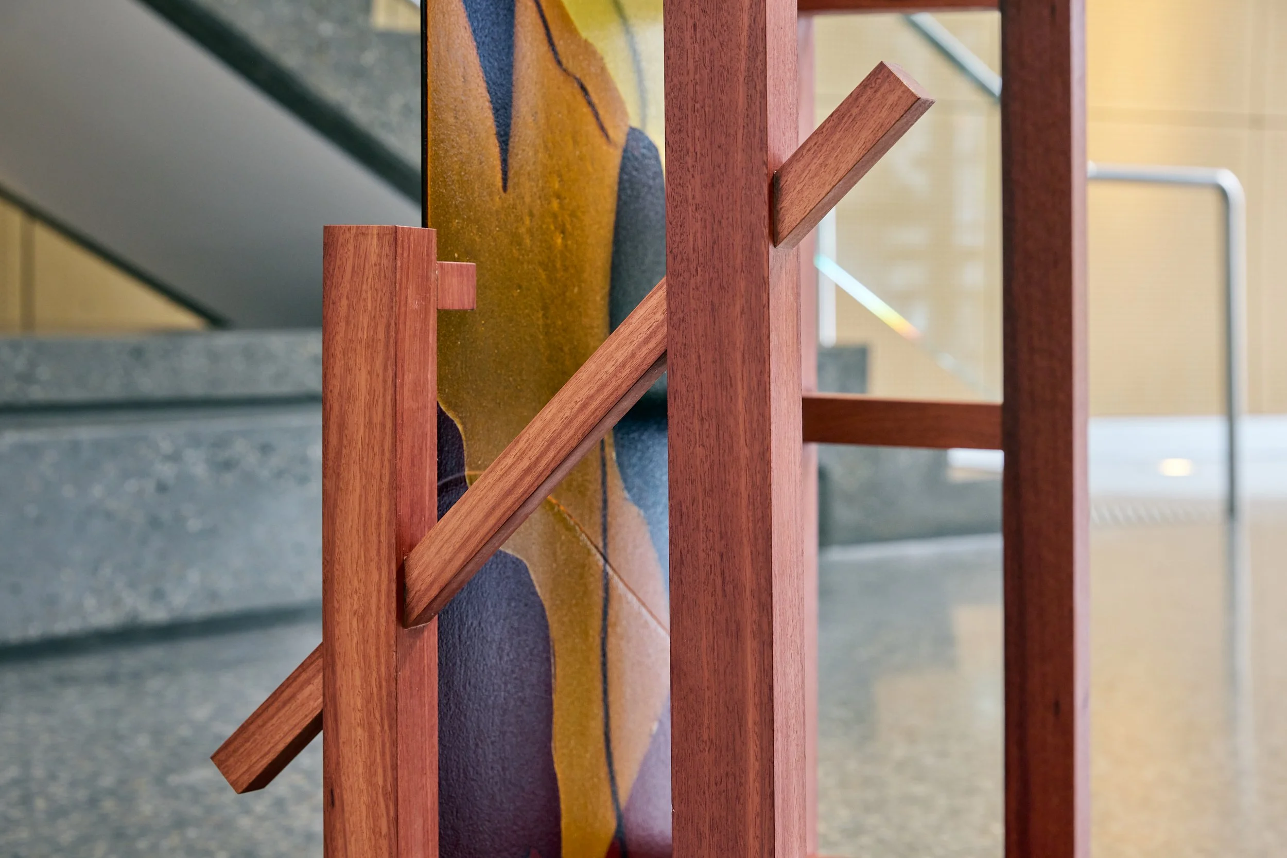 Minor truths I (detail), 2022, kiln formed glass, jarrah. Photo:  Jeremy Weihrauch