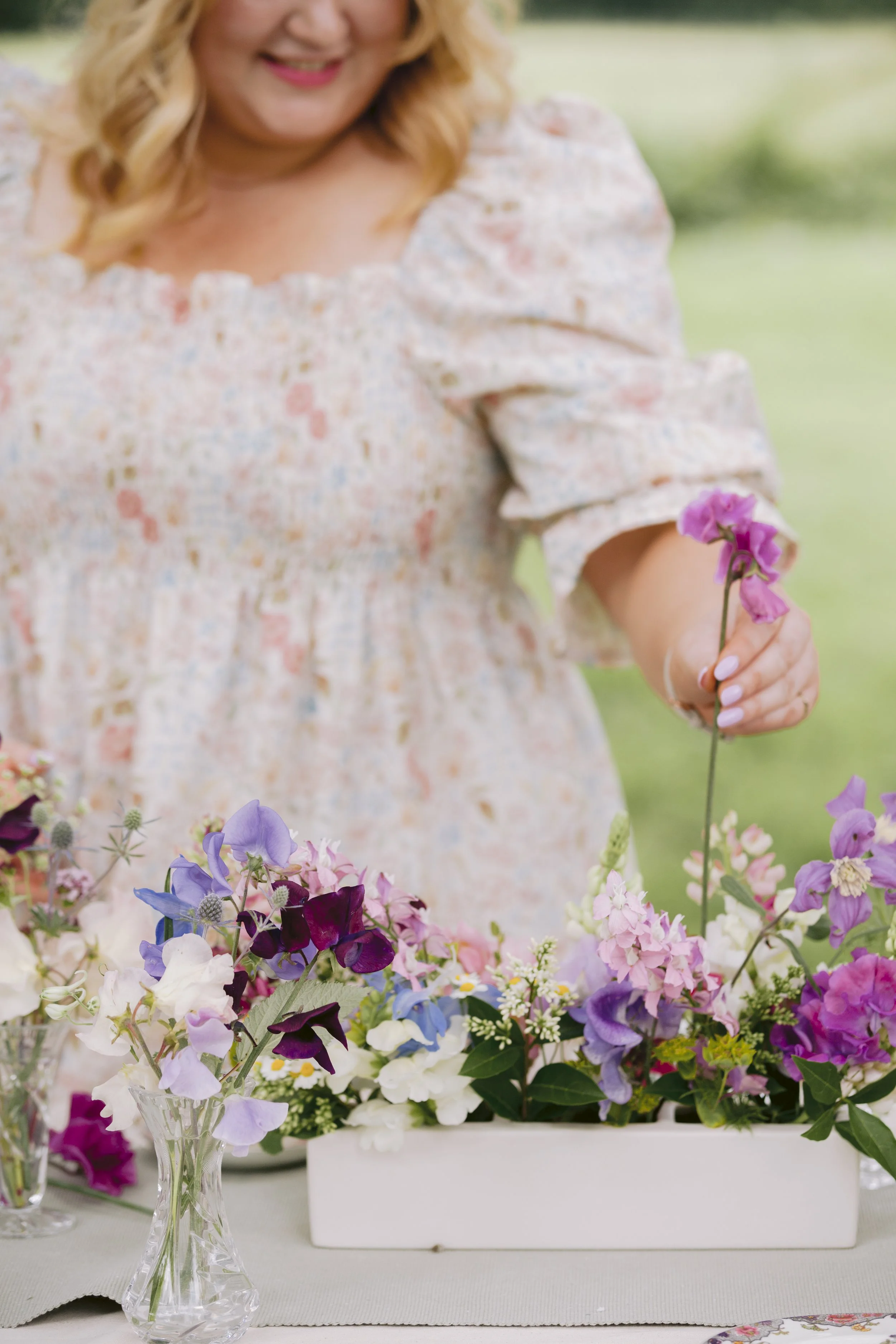 romantic wedding flowers UK with soft feminine floral arrangements and greenery