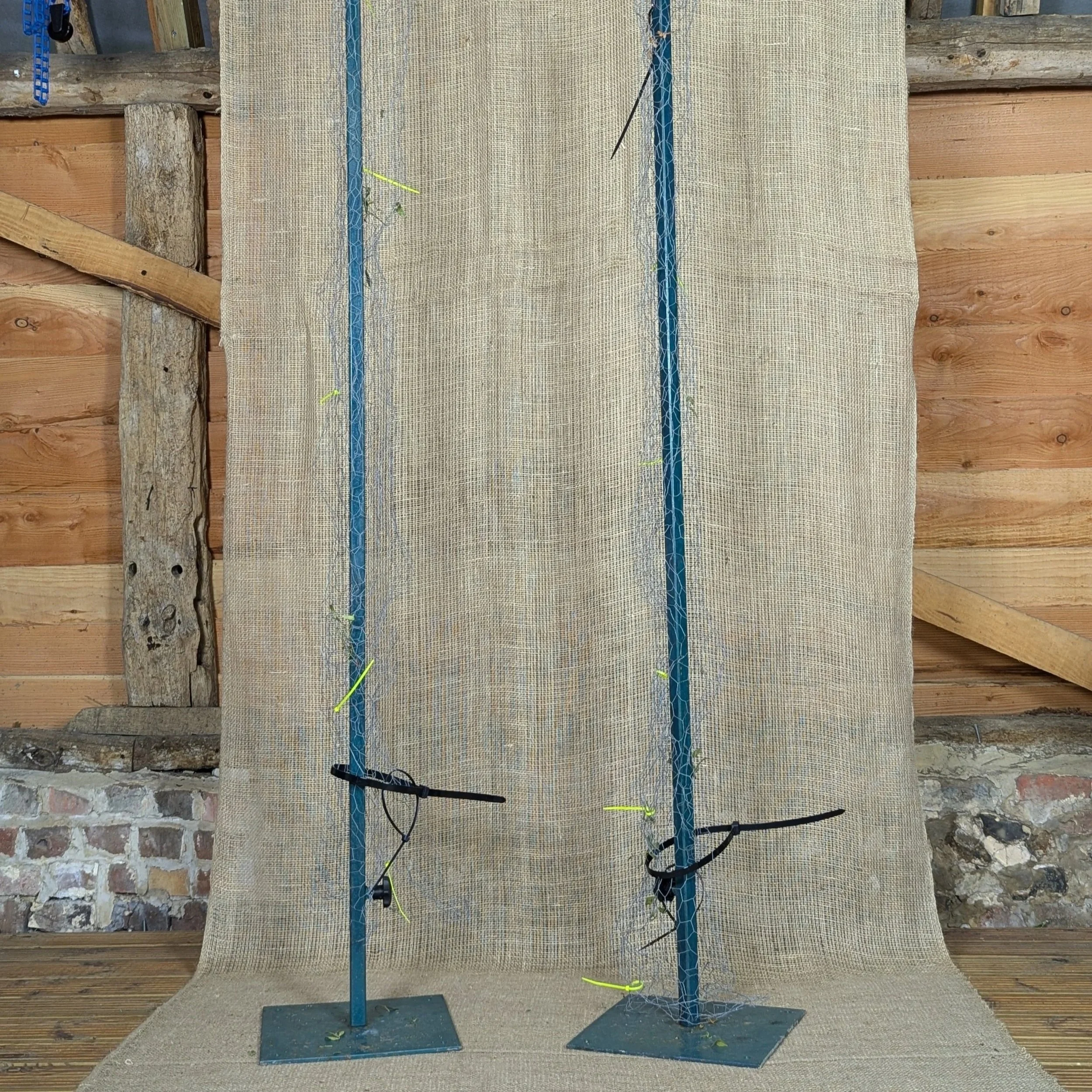 Steel pillars.

2 available.

£25 each.

Each pillar can be 5ft or 7ft.

Weighted base for stability with peg holes.