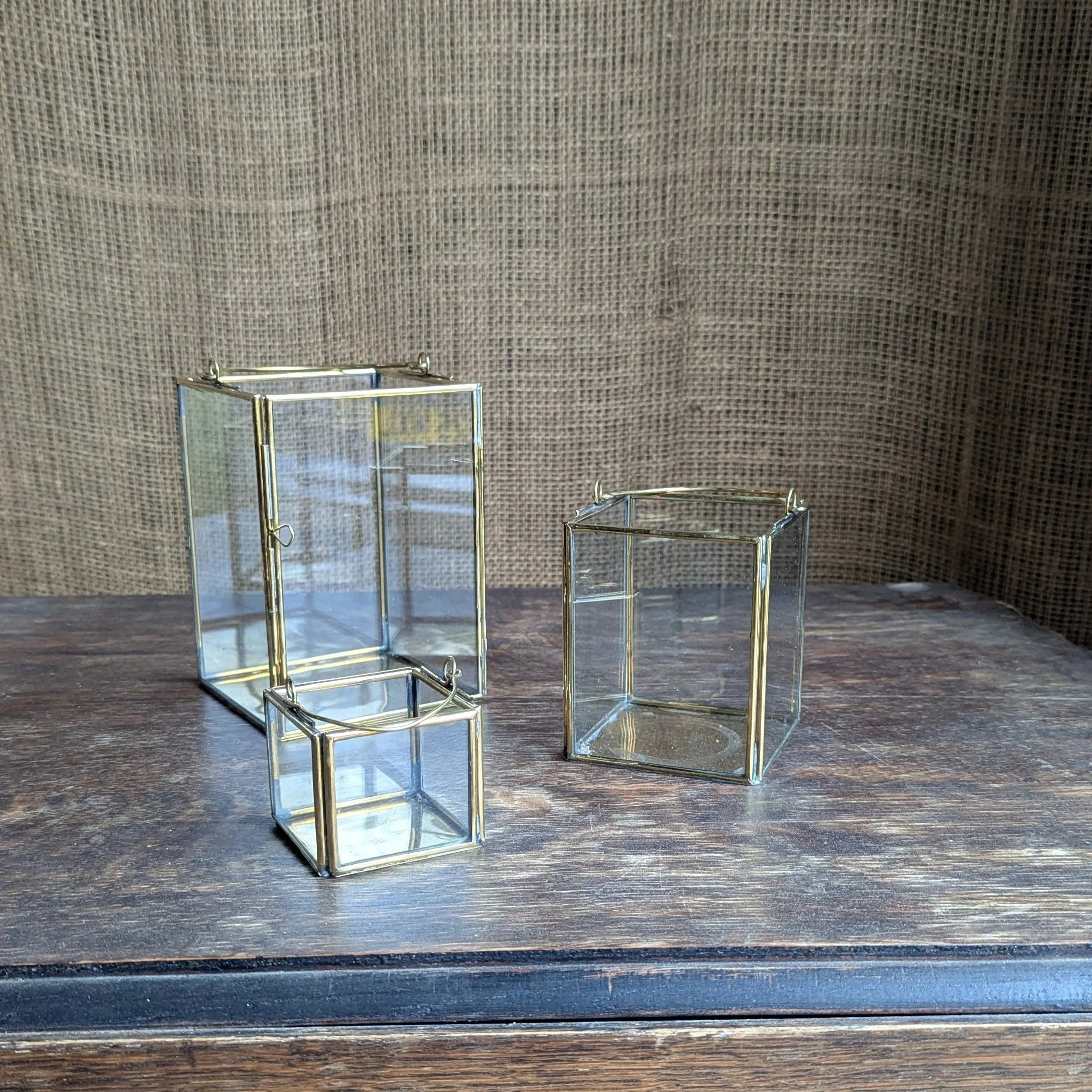 Table lantern trio.

6 trios available.

L= H16cm, W11cm, D11cm
M= H10cm, W8cm, D8cm
S= H5cm, W6cm, D6cm

£10 each.

Not to be used with real flame.
