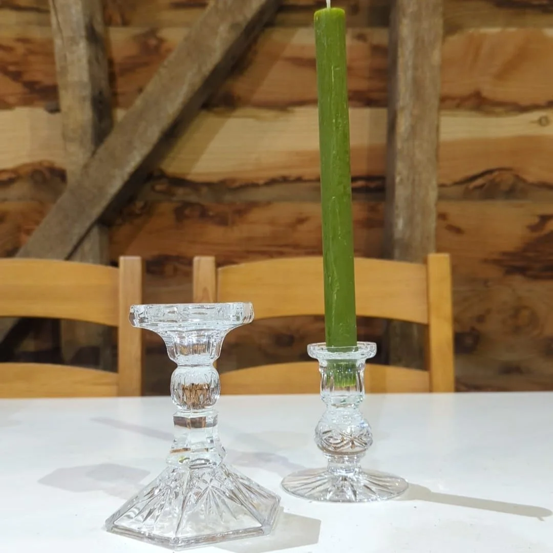 Glass candlestick.

20 available.

£1.50 each.

An assortment of similar designs.

Must be returned wax-clean.