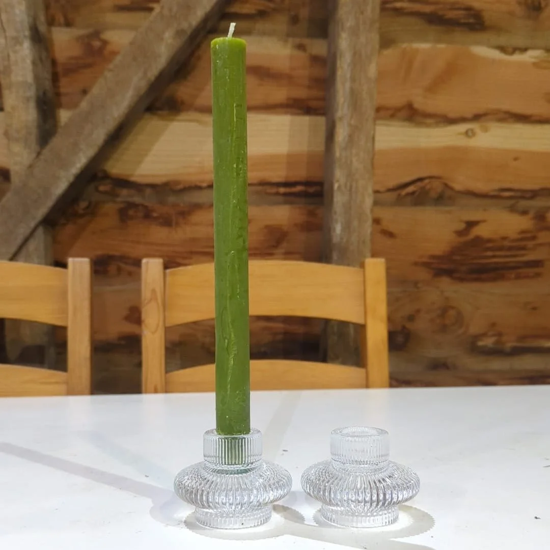 Ribbed glass double ended candleholders.

20 available.

£1 each.

Can be used for tealights or dinner candles. 

Must be returned wax-clean.