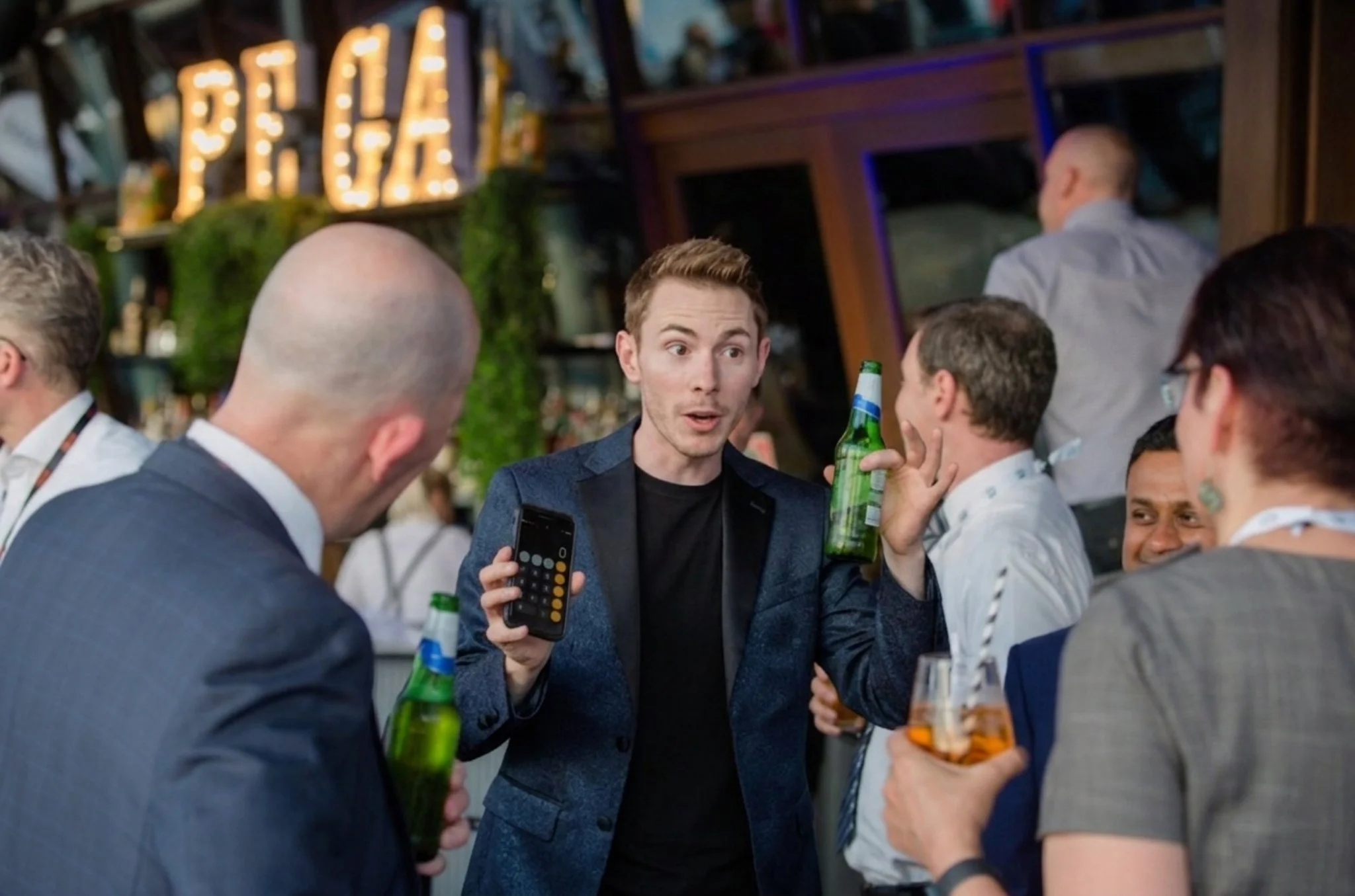 Toronto Magician Dylan Ballingall performing at a corporate mixer