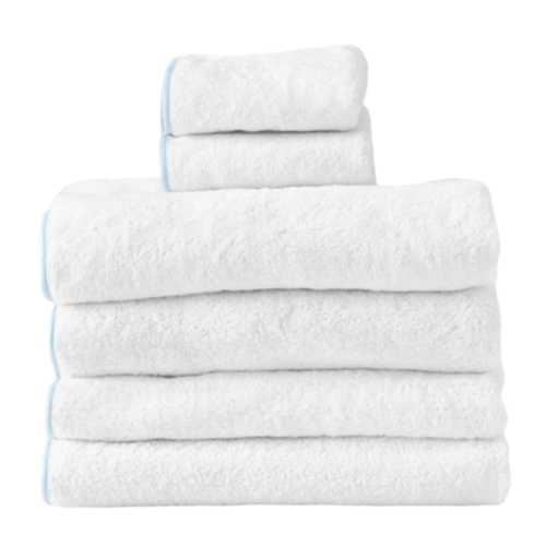 Stack of white bath towels with a small towel rolled on top.