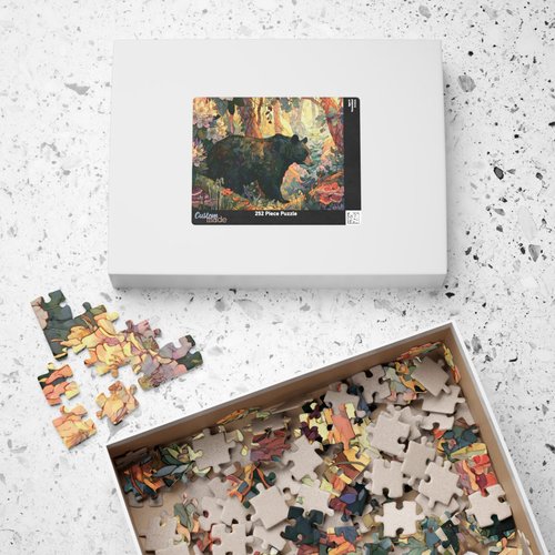 Black Bear Forest Art Puzzle shown with its artwork-reference box and puzzle pieces on a tabletop