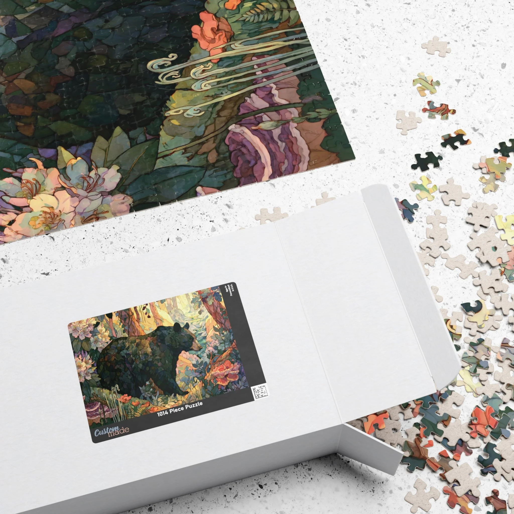 Black Bear Forest puzzle shown with box and pieces on a tabletop, featuring painterly Appalachian black bear artwork