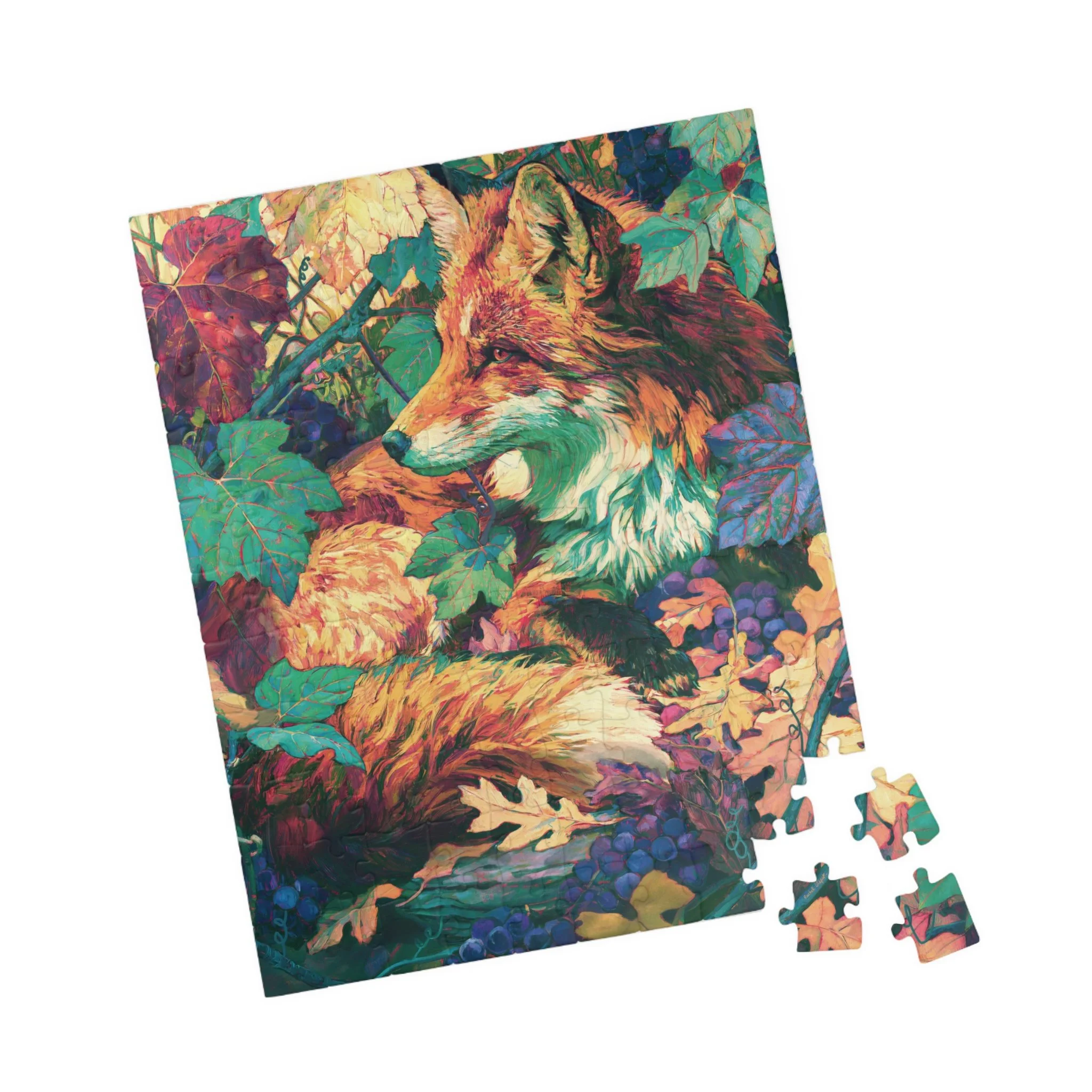 Red Fox in the Muscadine Vines puzzle with colorful pieces scattered beside the fox artwork, showing muscadine grapes, teal leaves, oak leaf litter, and copper fox fur