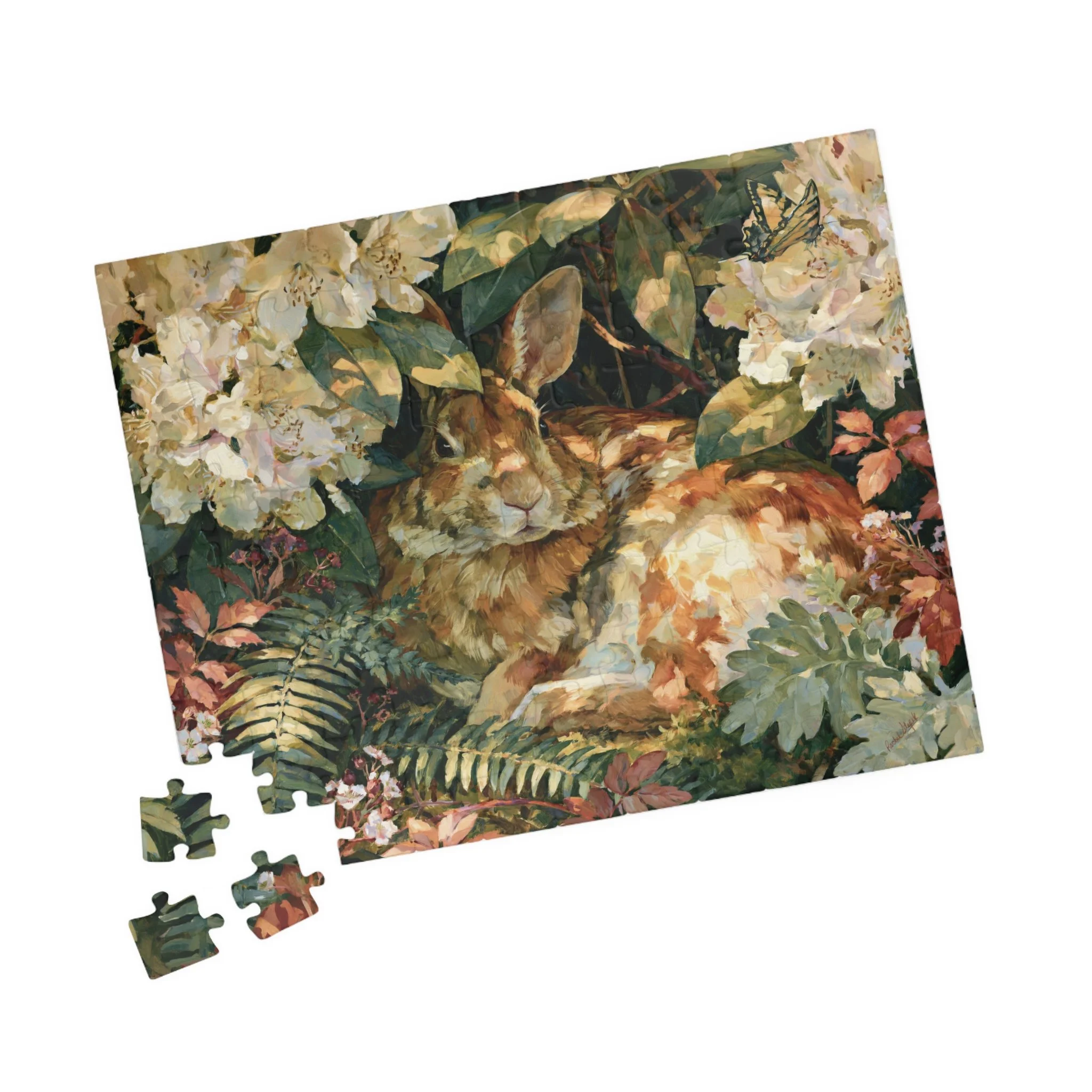 Rabbit in the Rhododendron jigsaw puzzle with original Lakehouse artwork of an Eastern cottontail hidden in rhododendron, ferns, moss, and warm woodland light
