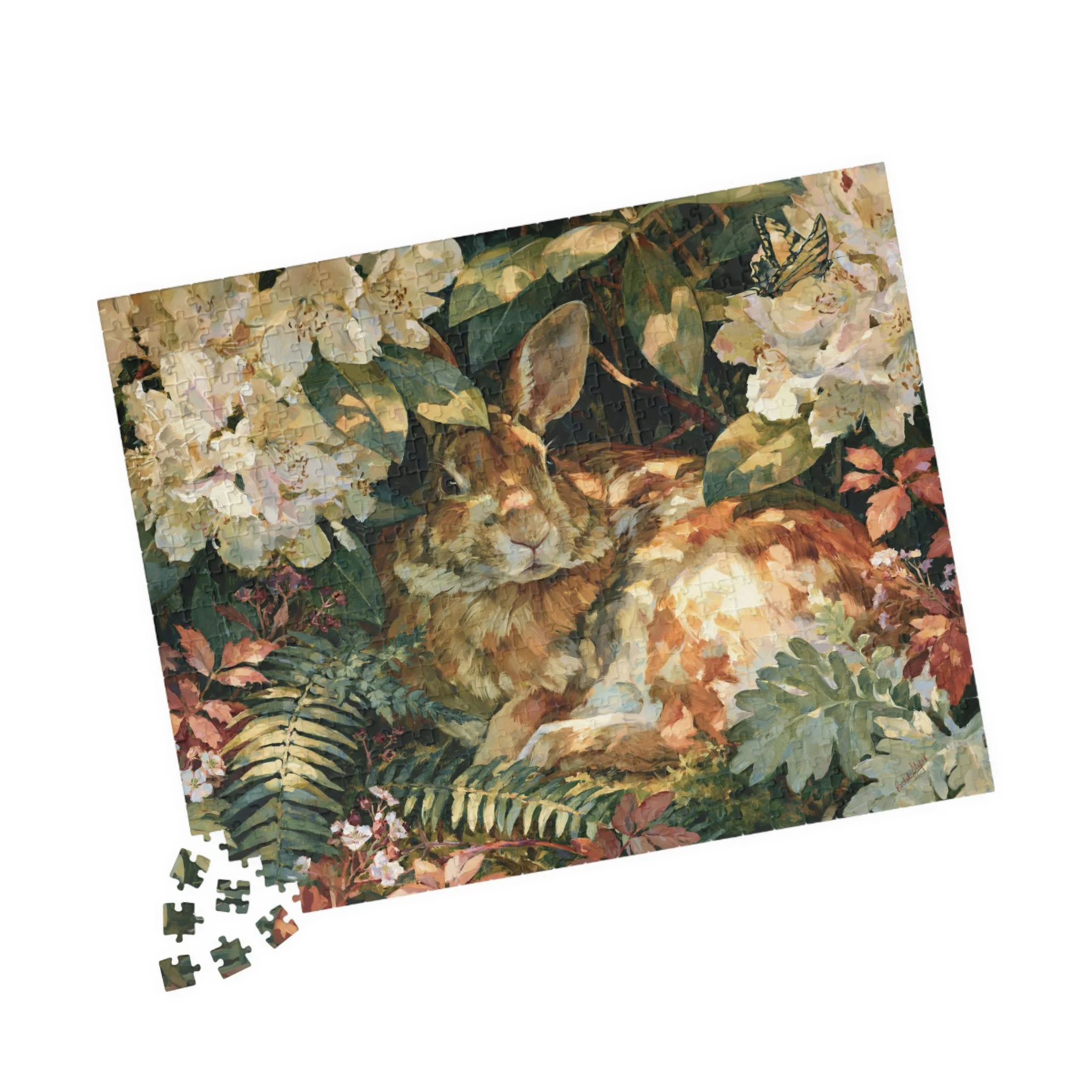 Rabbit in the Rhododendron jigsaw puzzle with original Lakehouse artwork of an Eastern cottontail hidden in rhododendron, ferns, moss, and warm woodland light