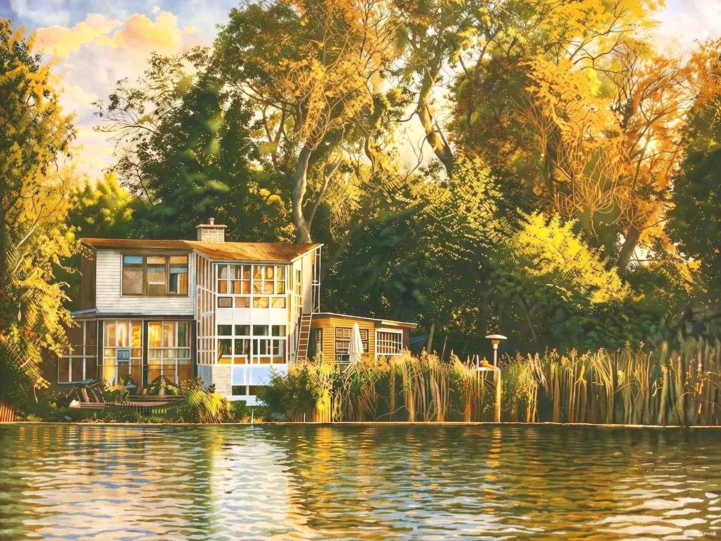 A modern house with large windows is situated by a lake, surrounded by lush trees and tall grasses, with the warm glow of sunset.