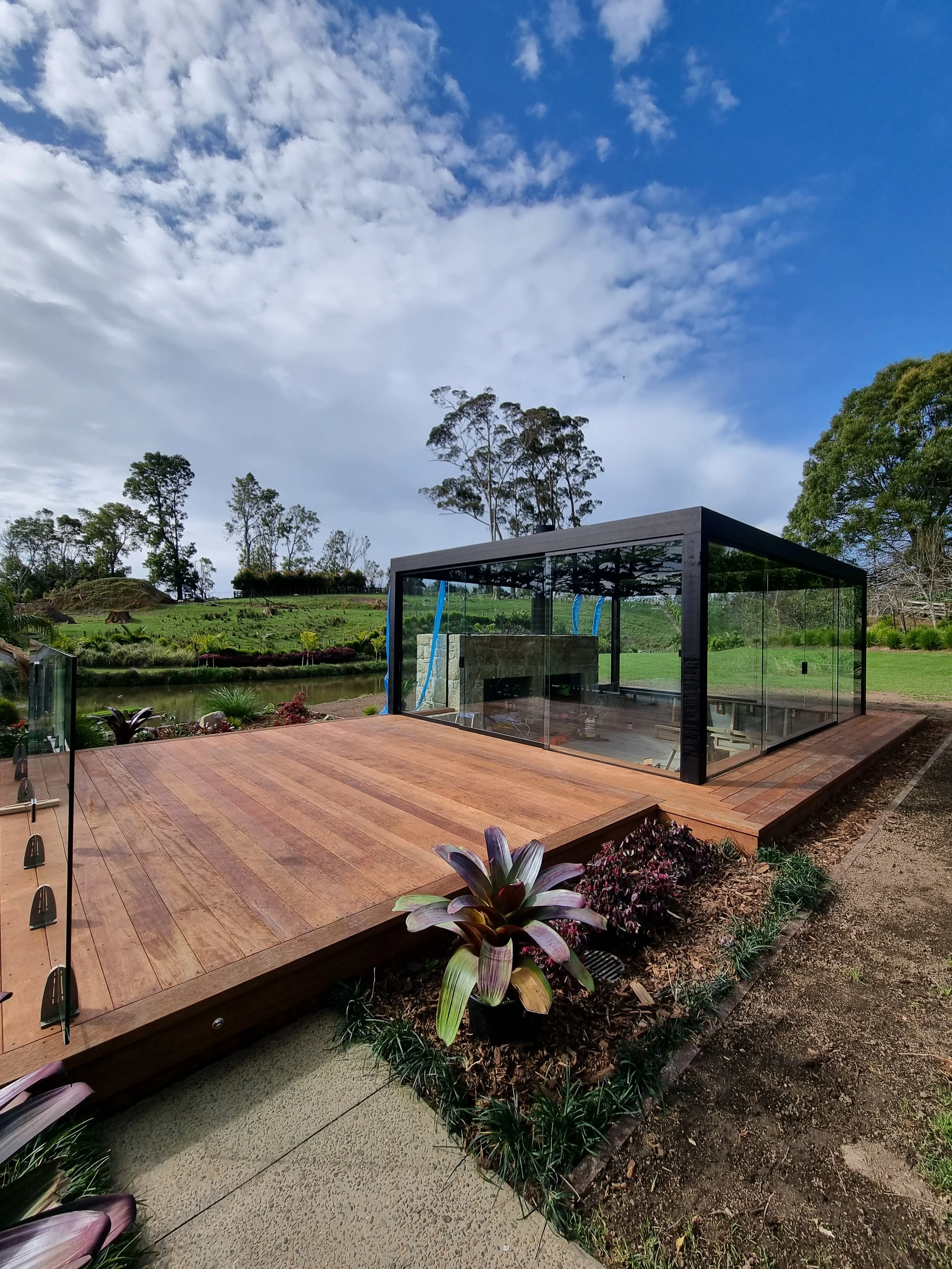 Sunken lounge with custom built seating. Wrap around kwila deck