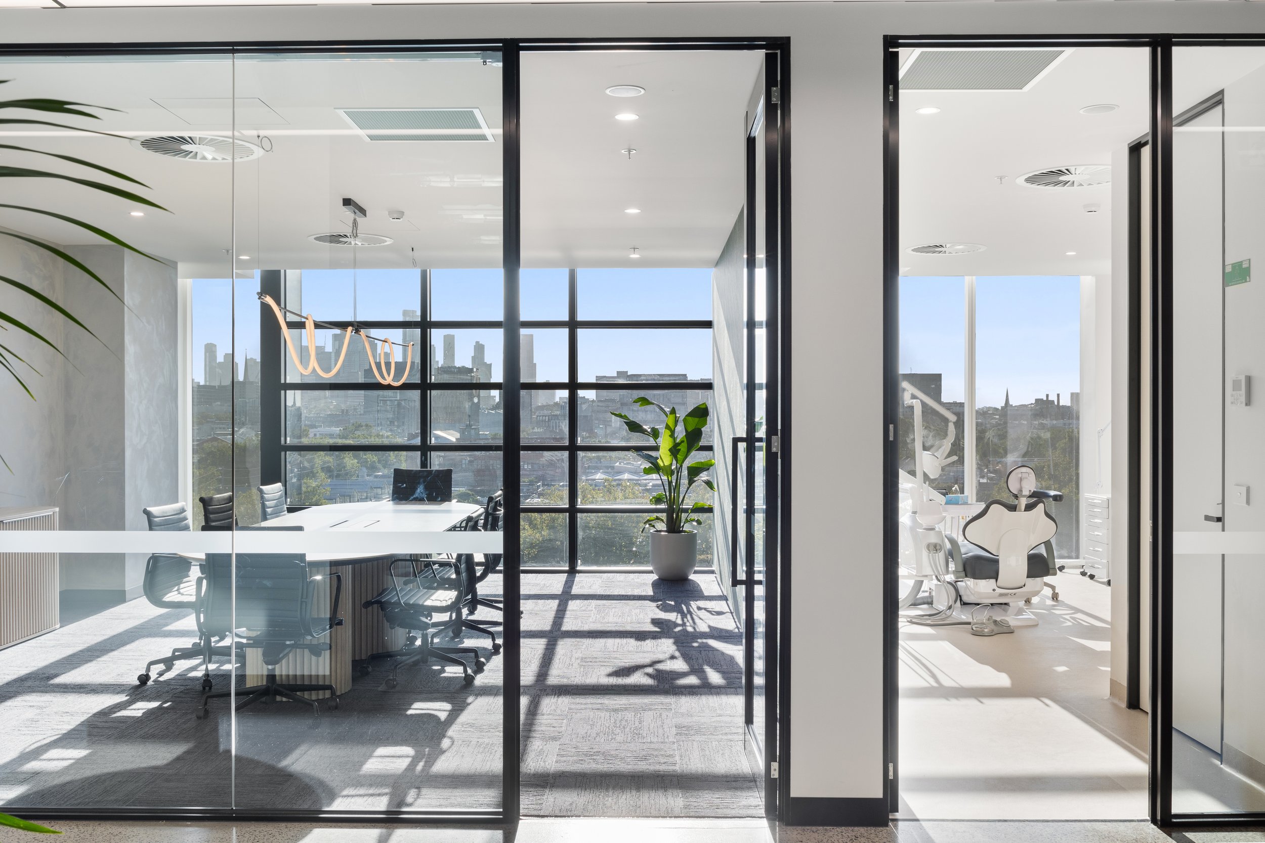 Consultation room at The Bonding Studio with Melbourne skyline views