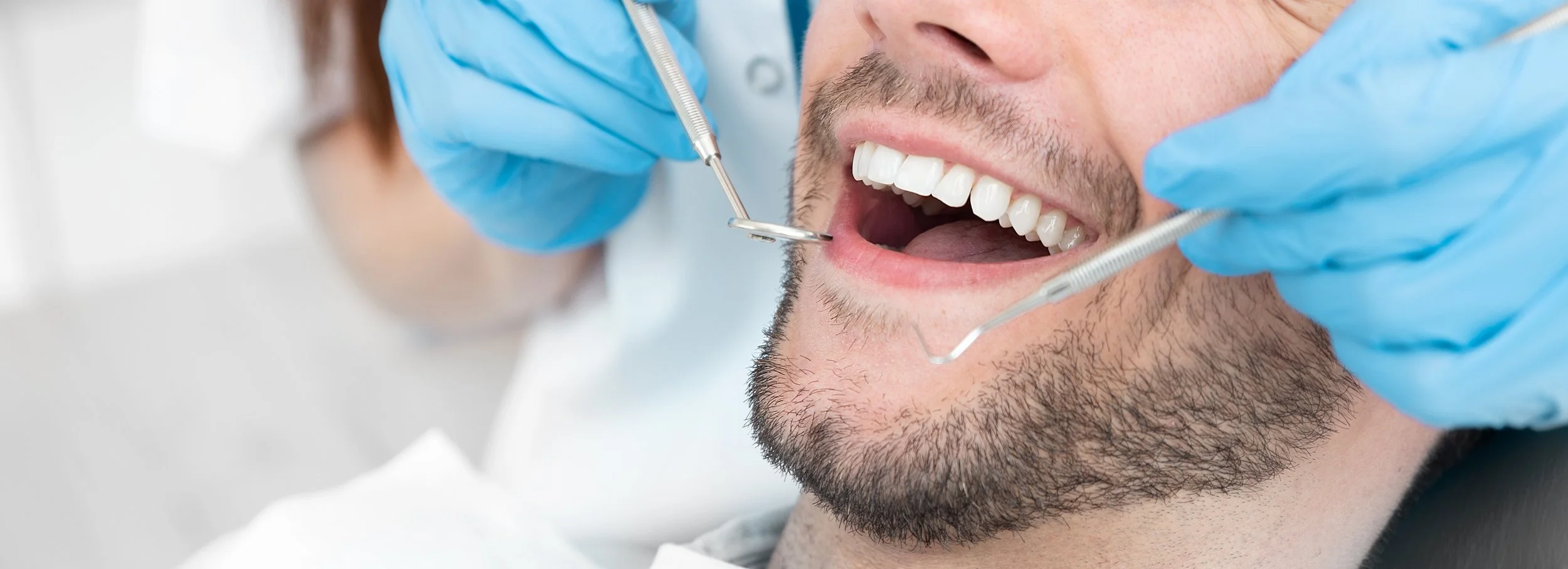 Close-up of a man having dental treatment