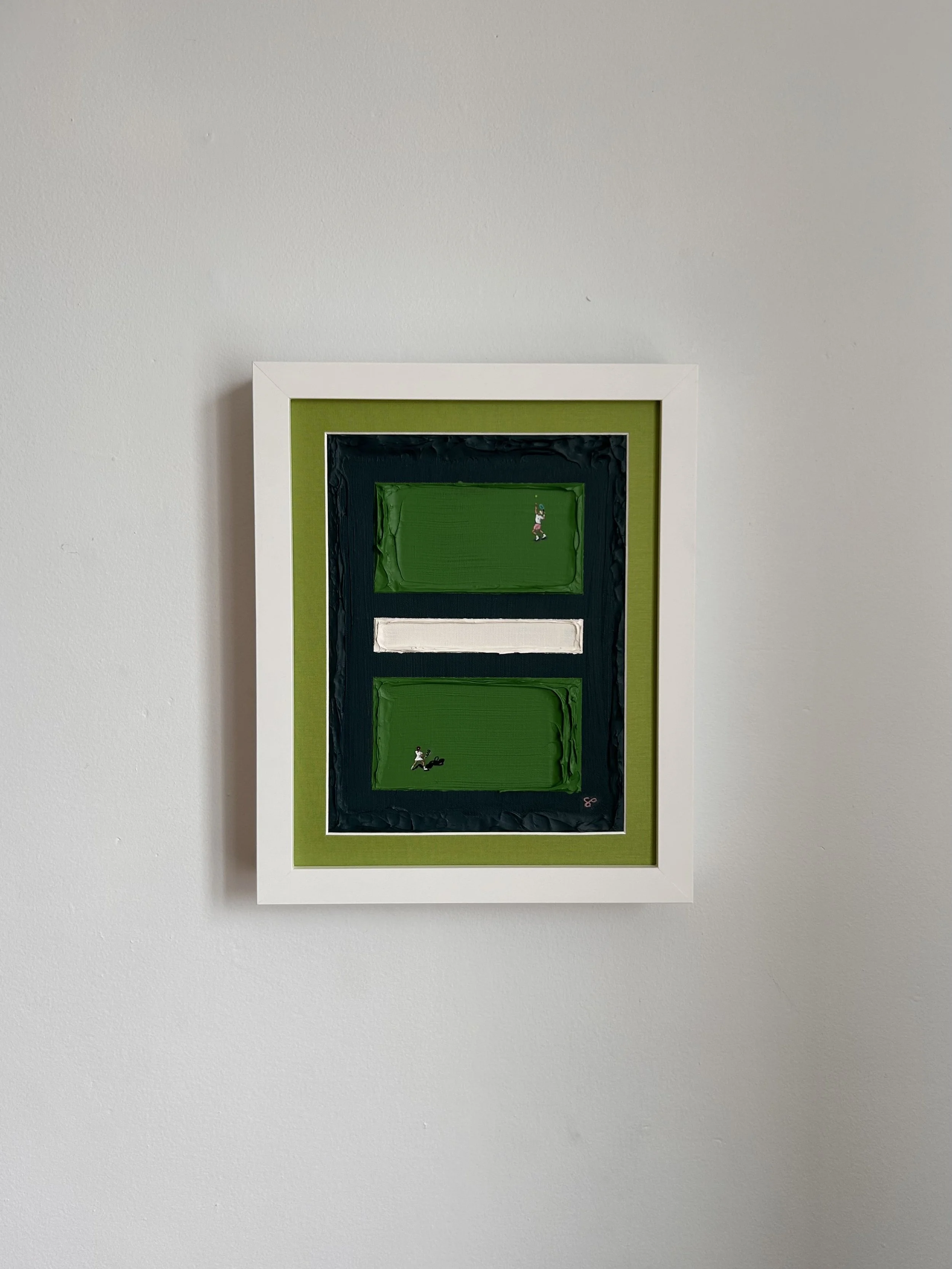 Painting of a tennis court with two small players, framed on a wall.