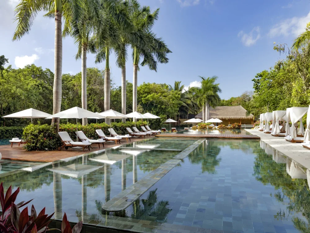 pool-side-seating-at-grand-velas-riviera-maya-playa-del-carmen.webp