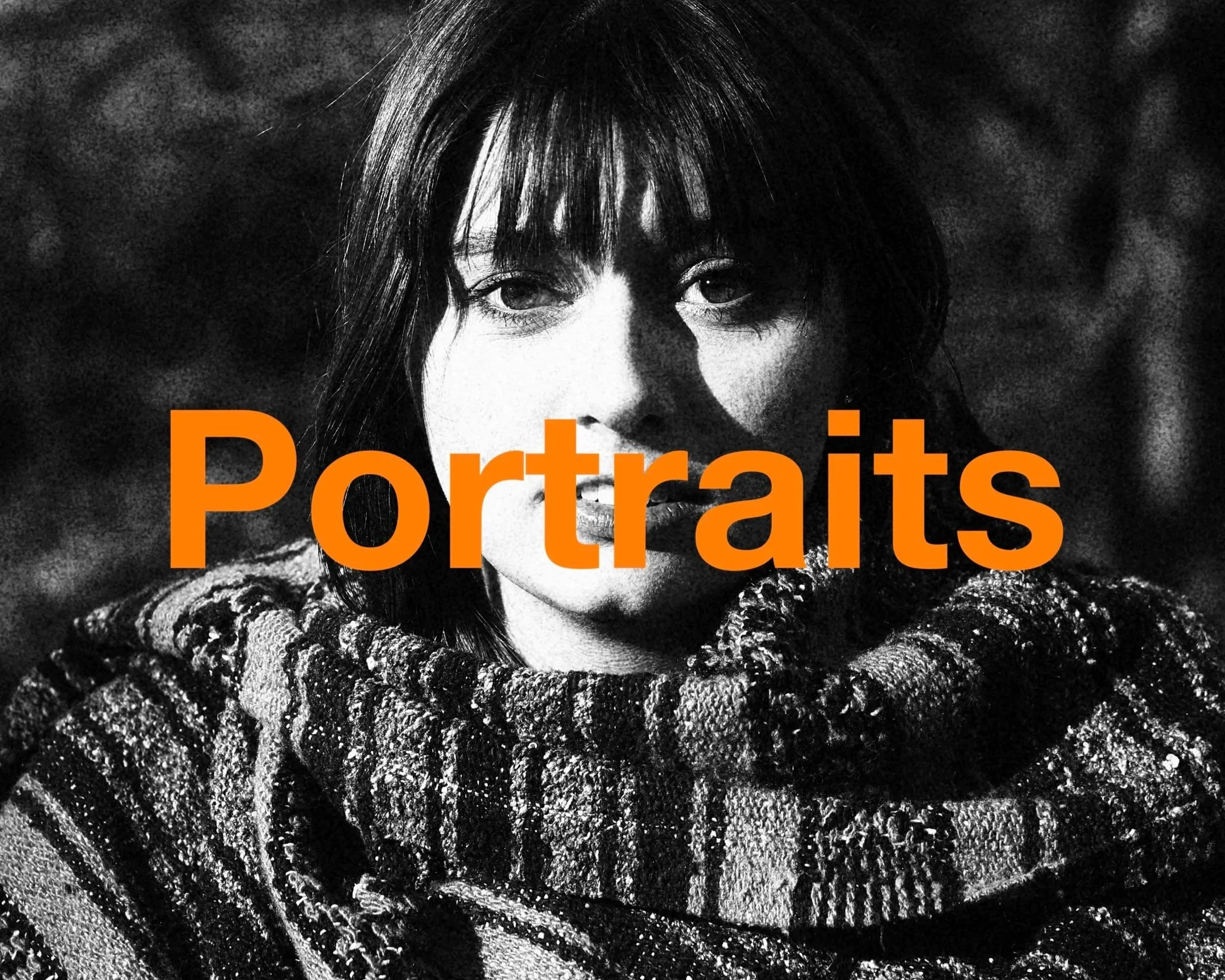 A black-and-white portrait of a woman with dark hair and bangs, wearing a textured sweater, with the word 'Portraits' in orange text over the lower part of the image.