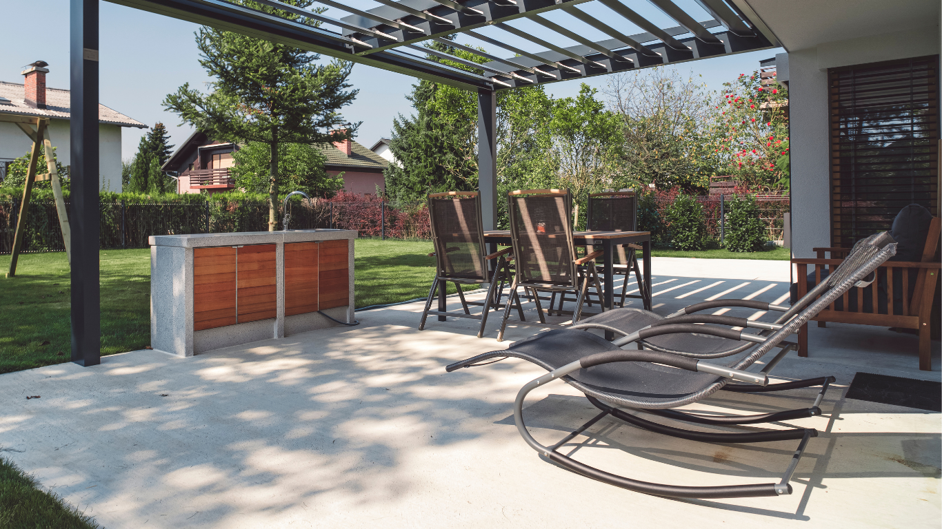 Custom concrete patio installation by Concrete Concepts & Exteriors featuring a clean finished design, professional craftsmanship, and a durable outdoor living space built to enhance curb appeal