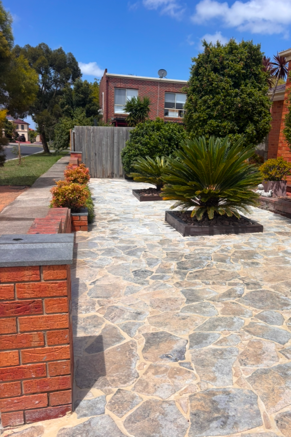 Front yard paving services in Melbourne with natural stone finish