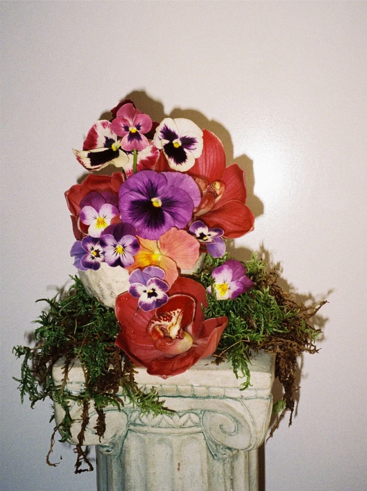 Floral sculpture made with pansies and viola for an editorial shoot