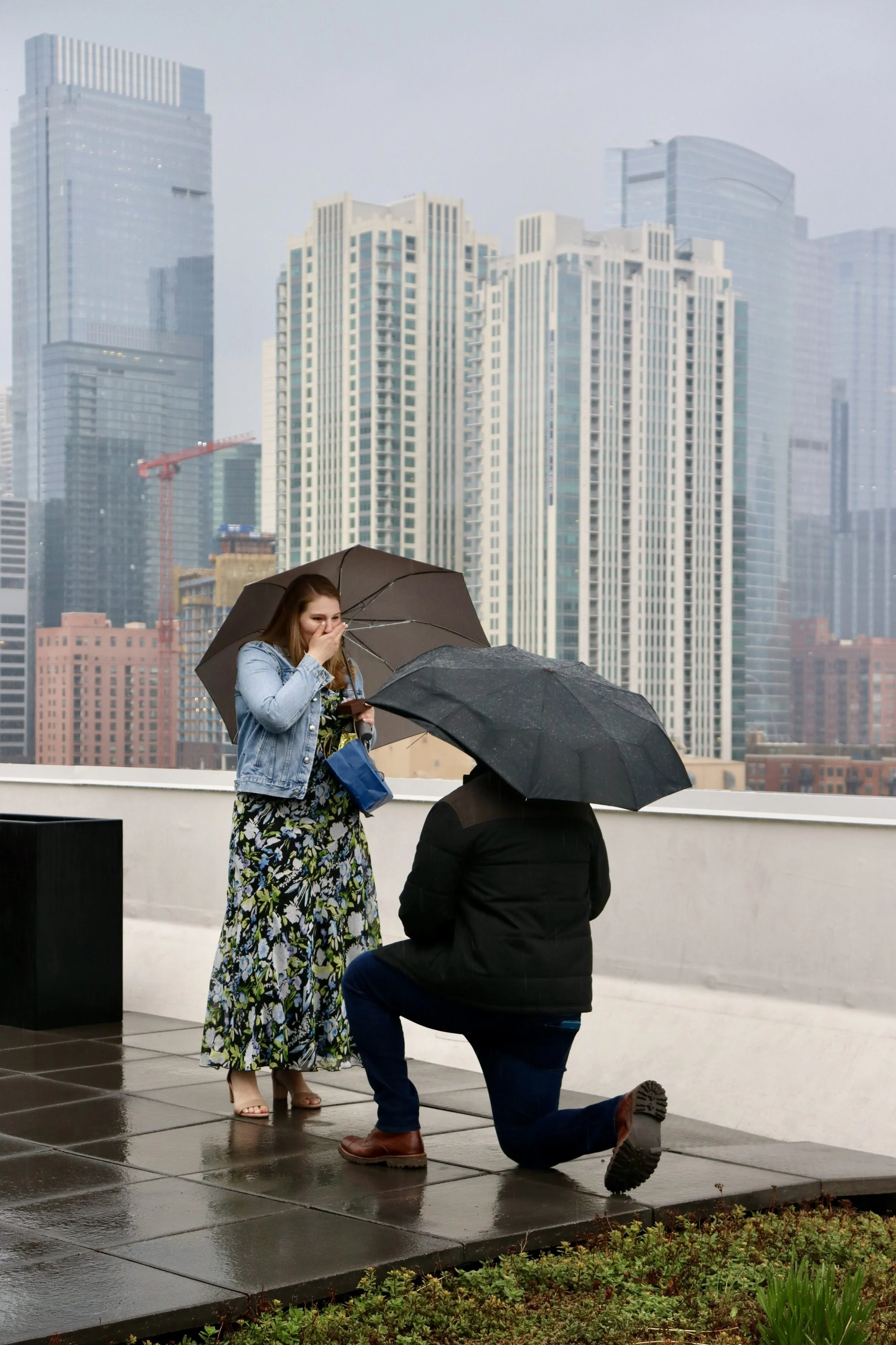 Jojo Rubnitz Photography Engagement city raining umbrellas.JPG