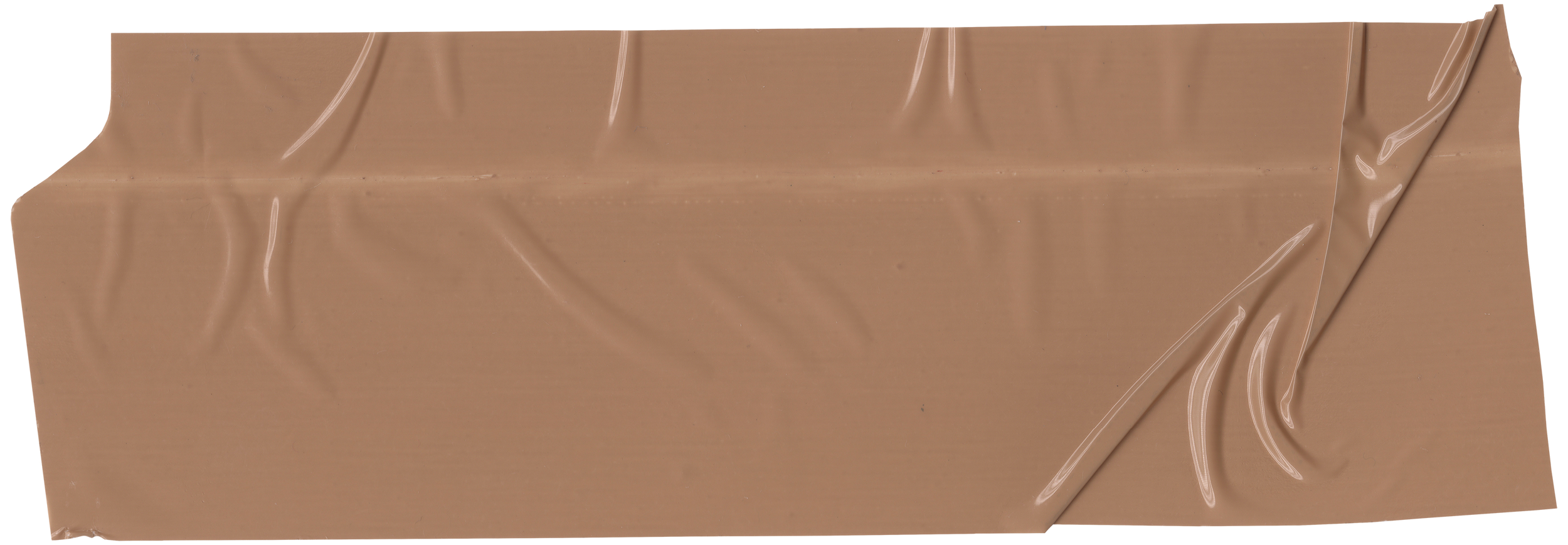 Close-up of a piece of milk chocolate with a smooth and shiny surface.