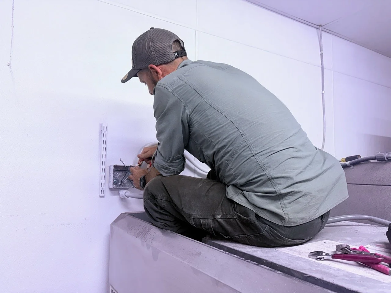 clover technician repairing commercial refrigeration equipment in Clarksville, TN