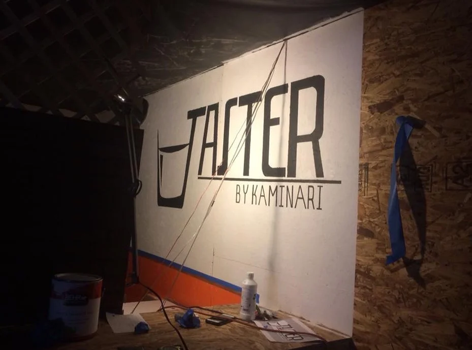 Installing the mural before the taproom opened