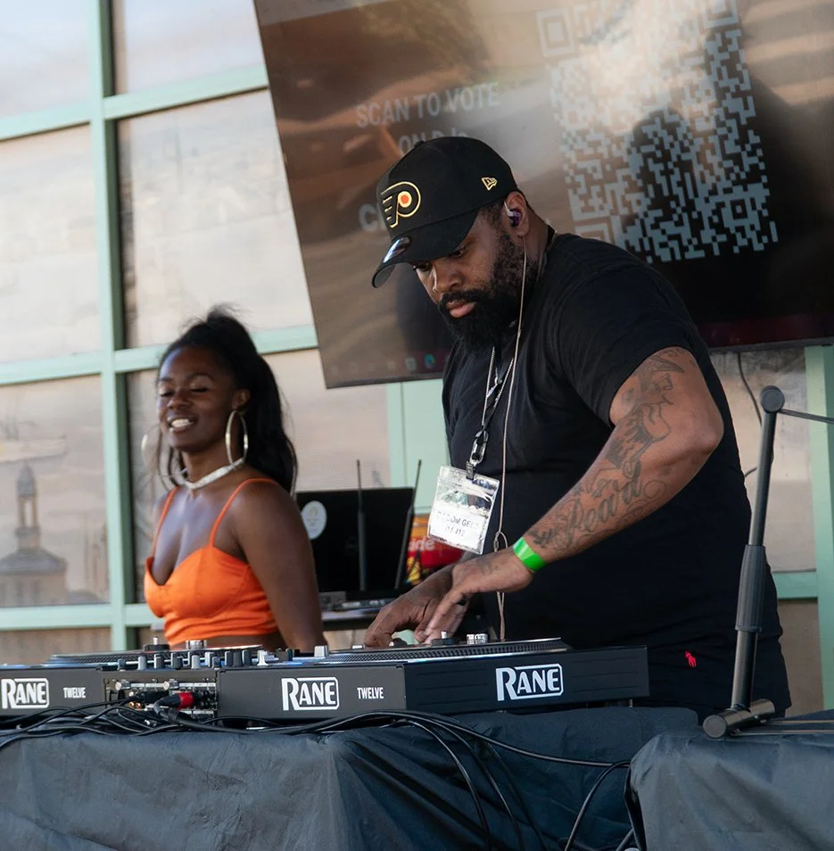 DJ Dom Geez performing at the 2026 Chamber 215 prelims at Liberty Point