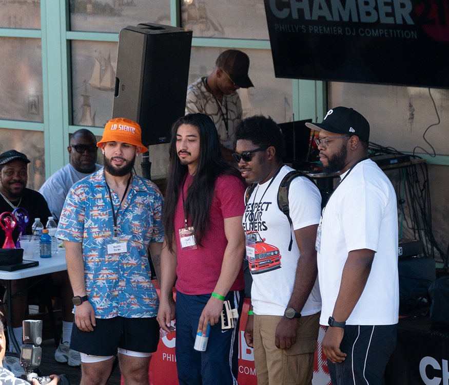 Santi, YNGFU, DJ Proud, and DJ Don Will on stage at the 2026 Chamber 215 prelims at Liberty Point