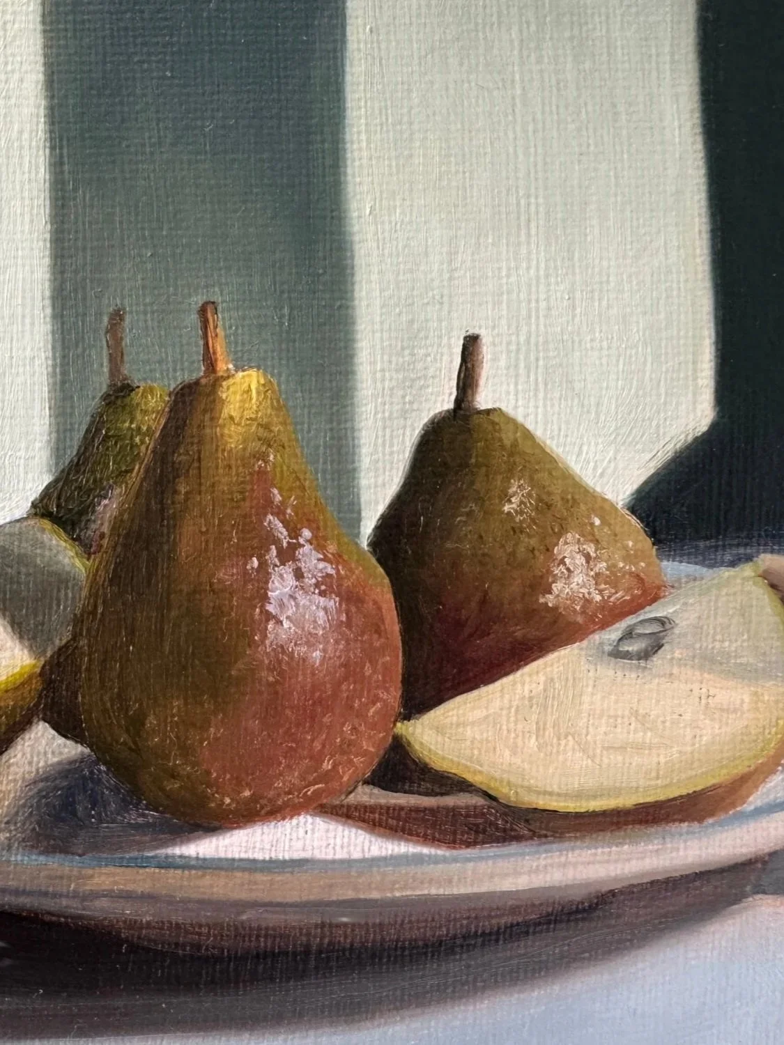 Close up of still life oil painting of pears showing brushwork and texture