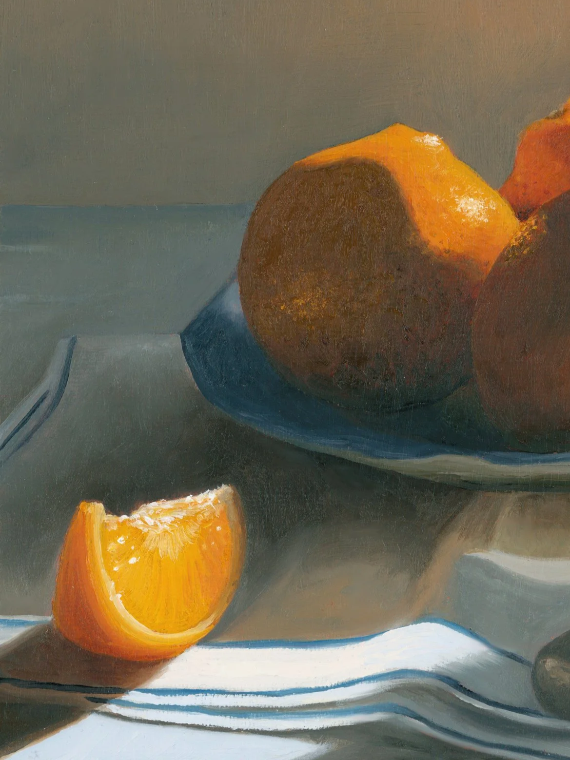 Close up of fine art print of a still life of oranges on a plate showcasing brushwork and texture