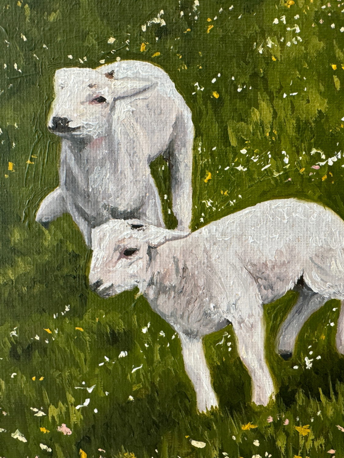 Close up of fine art reproduction of three lambs to show details and brushwork