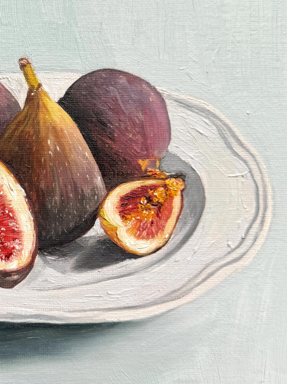 Close up of still life oil painting of figs showing brushwork and texture